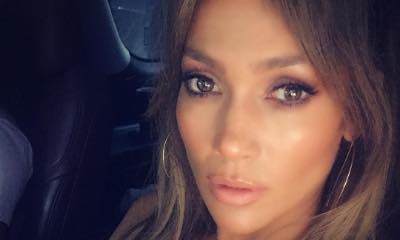 Jennifer Lopez Flaunts Major Cleavage and Bares Torso During Gym Session