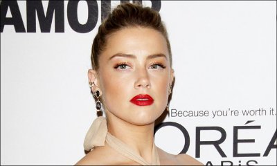 Video: Amber Heard Engaged in Steamy Makeout Session With Mystery Hunk