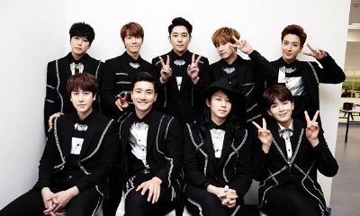 Kangin Reunites With Super Junior Members in New Photo