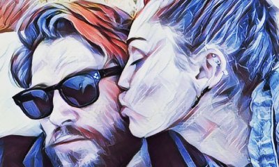 Liam Hemsworth Gets a Sweet Smooch From Miley Cyrus in New Artsy Pic