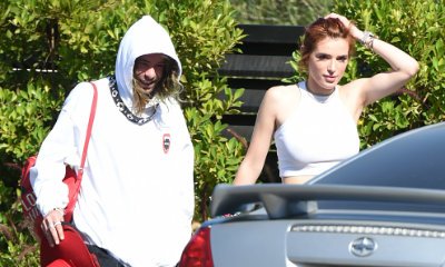 Braless Bella Thorne Flaunts Hairy Armpits in Sunny Outing With BF Mod Sun