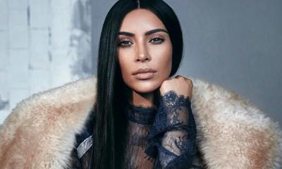 Kim Kardashian Accused of Racism for Dressing as Aaliyah for Halloween