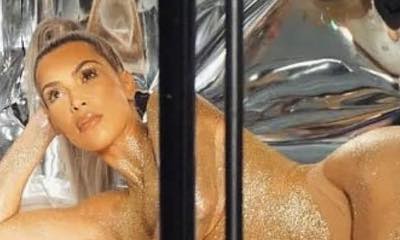 Nearly-Naked Kim Kardashian Flashes Famous Derriere in BTS Pics From KKW Beauty Photoshoot