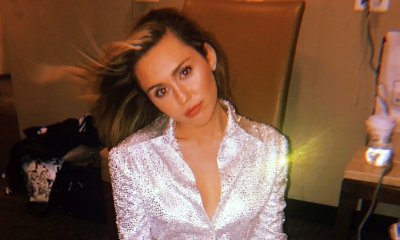B***h Is Back! Miley Cyrus Shares Sultry Photos in Glittering Outfit