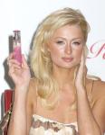 Paris Hilton Holds Her New Fragrance