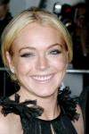 Lindsay Lohan Temporarily Fell Off the Wagon, Caught Drinking Champagne