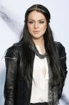 L.A. Paparazzi Force Lindsay Lohan to Spend Night at Home