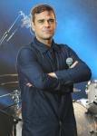 Robbie Williams to Shift Stubborn Pounds for Take That Return by Joining Triathlon