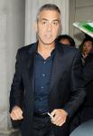 George Clooney Blessed by Woman With Spit