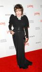 Joan Collins Blames Greed for Obesity