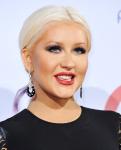 Christina Aguilera Calls Simon Cowell a 'D*ck'