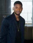 Usher's Son Spotted at Play Center Wearing Bandage After Hospital Release