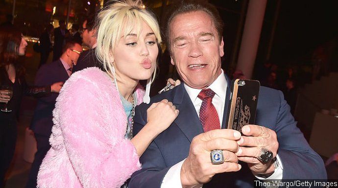 Arnold Schwarzenegger and Miley Cyrus Reunite One Year After She Broke Up With His Son