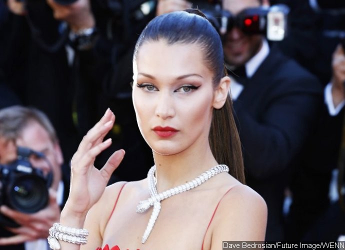 Bella Hadid Enjoys Dinner Date With Mystery Hunk in Rome and Leaves With Bouquet of Roses