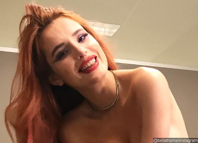 Bella Thorne Flaunts Ample Cleavage After Cozying Up to New Rapper Boyfriend