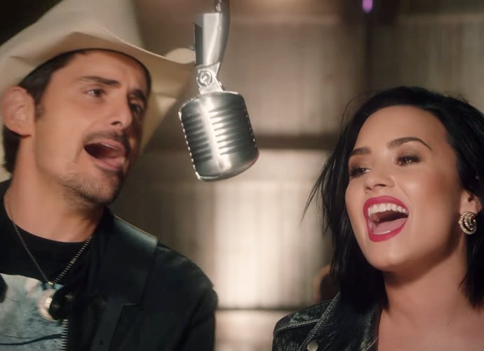 Brad Paisley and Demi Lovato Premiere Fun Music Video for 'Without a Fight'
