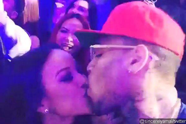 Chris Brown and Karrueche Tran Kiss on New Year's Eve