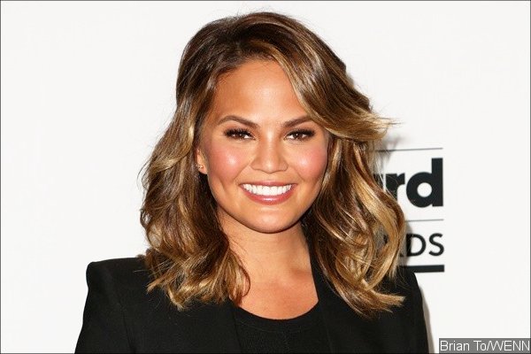 Chrissy Teigen Reacts to Backlash After Tripping Woman at Billboard Music Awards