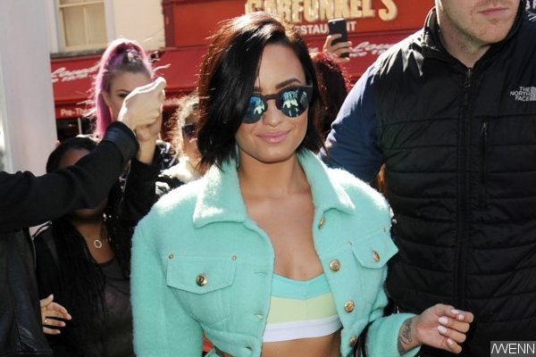 Demi Lovato Hints at Bisexuality, Says She's Had Experience With It