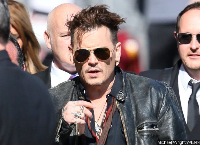 Johnny Depp Looks Dispirited While Leaving His Hotel in Frankfurt