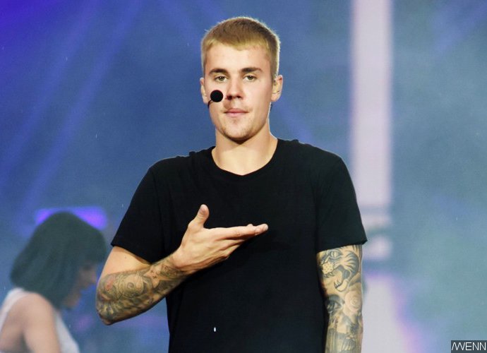 Justin Bieber Scolds Backup Singers and Tells Bad Jokes While Fighting a Cold on London Gig