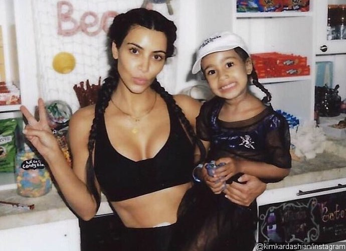 Kim Kardashian Slammed Over Topless Photo Taken by Her Daughter North West