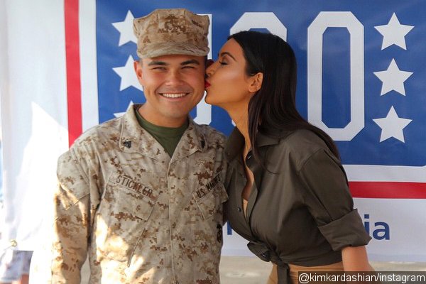 Kim Kardashian Visits U.S. Troops, Gives a Man a Kiss on the Cheek