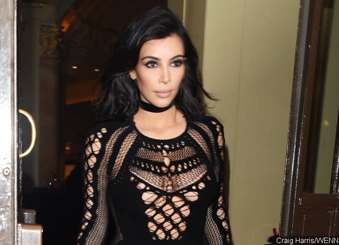 Kim Kardashian Wears Sheer Top to Show Off 42-Pound Weight Loss