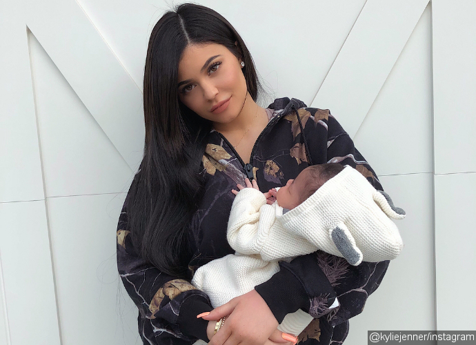 Kylie Jenner Cradles 'Angel Baby' Stormi in Adorable 1-Month Photos