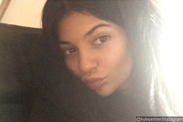 Kylie Jenner Goes Make-Up Free on Plane to Miami in New Pic