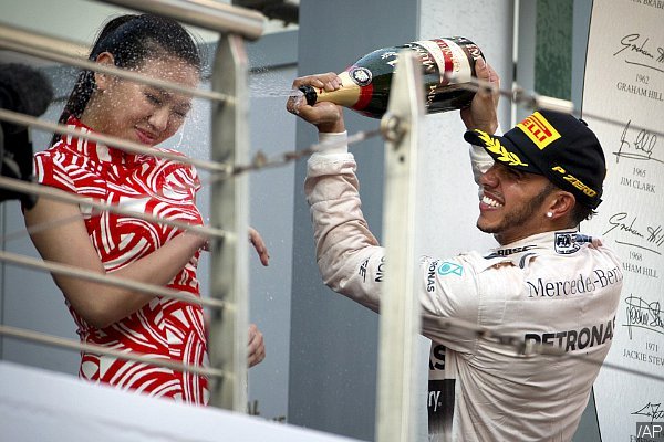 Lewis Hamilton Criticized for Spraying Hostess in the Face With Champagne at Chinese Grand Prix