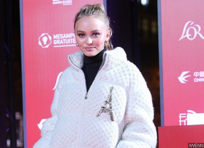 Lily-Rose Depp Shares Topless Pic From Beachy Vacation