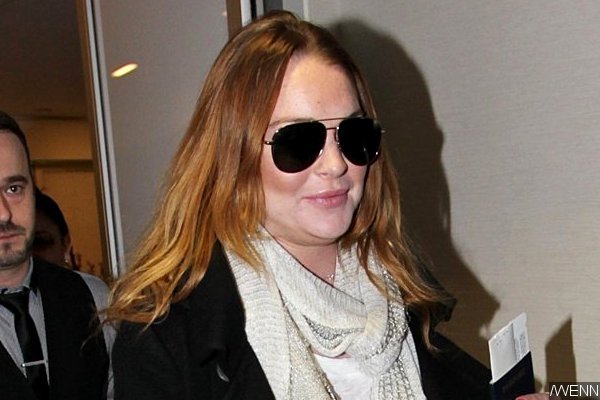 Lindsay Lohan Spotted Carrying Quran During an Outing in Brooklyn