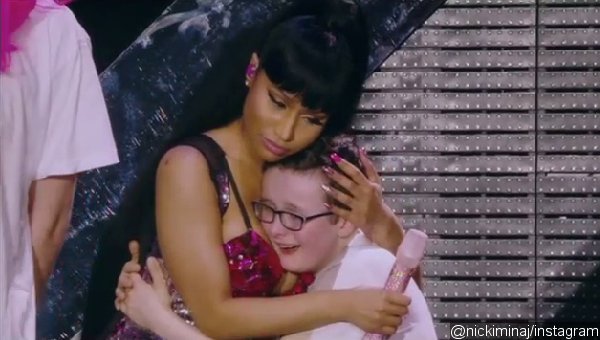 Nicki Minaj Comforts a Crying Fan With Her Breasts