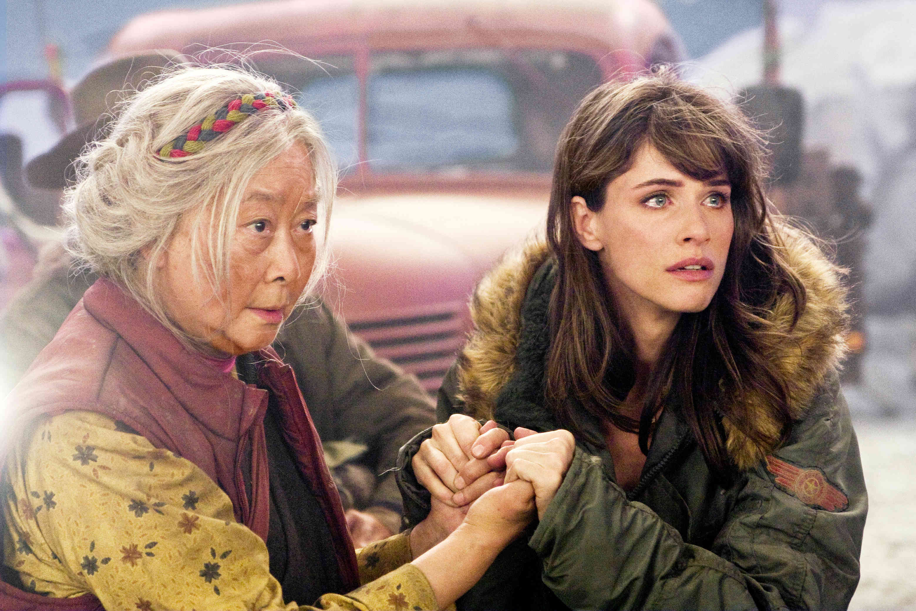 Lisa Lu stars as Grandmother Sonam and Amanda Peet stars as Kate in Columbia Pictures' 2012 (2009)