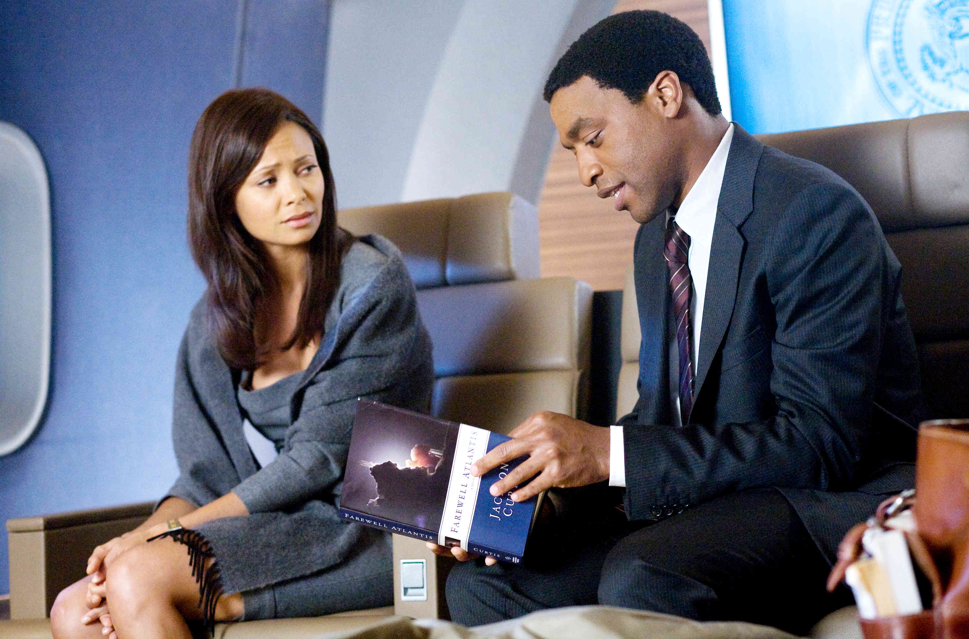 Thandie Newton stars as Laura Wilson and Chiwetel Ejiofor stars as Adrian Helmsley in Columbia Pictures' 2012 (2009)