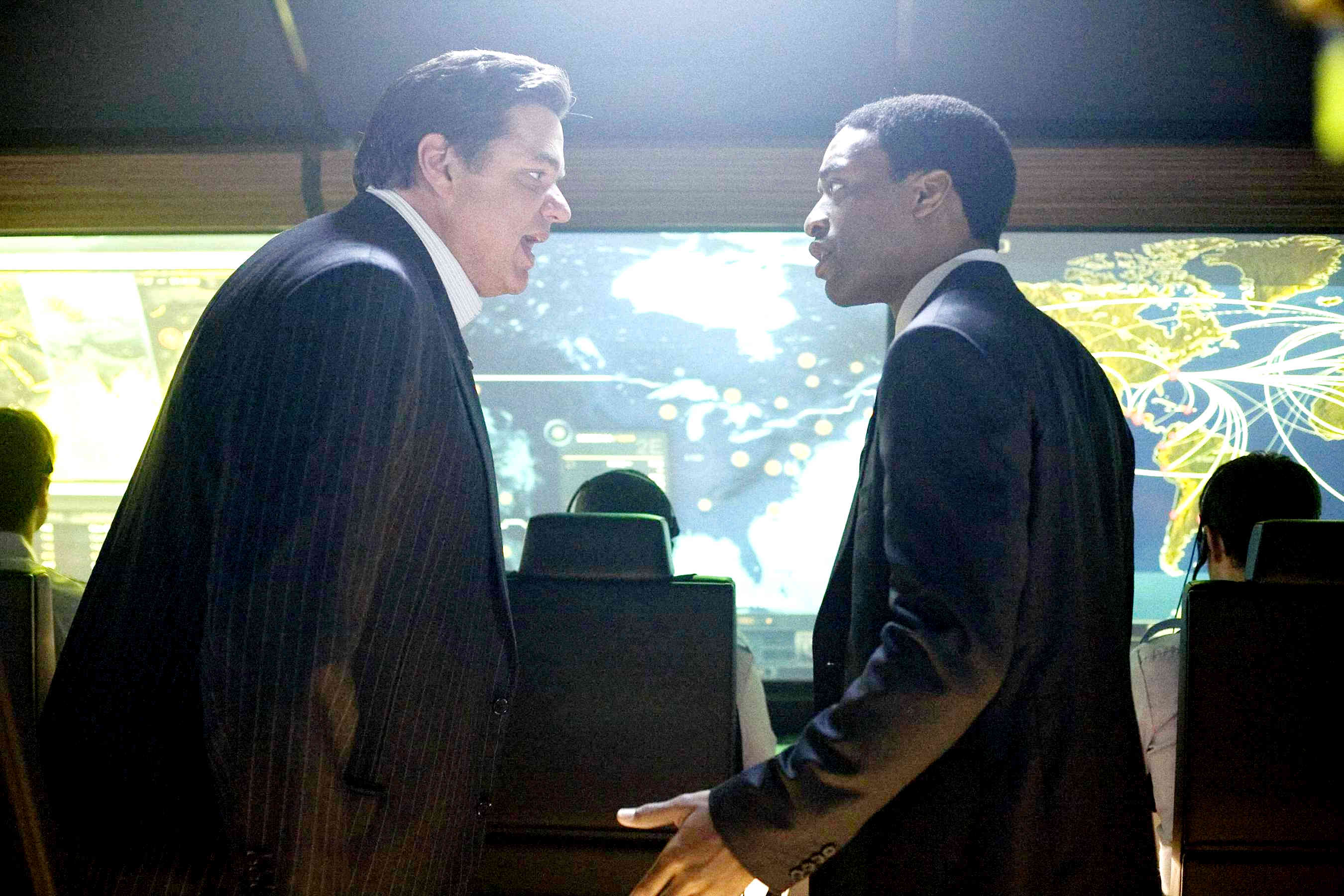 Oliver Platt stars as Carl Anheuser and Chiwetel Ejiofor stars as Adrian Helmsley in Columbia Pictures' 2012 (2009)