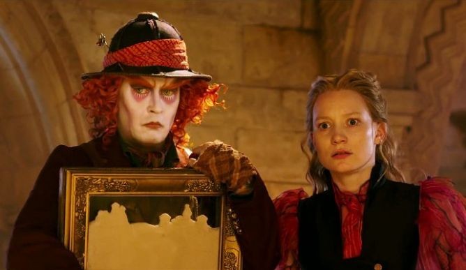 Johnny Depp stars as Mad Hatter and Mia Wasikowska stars as Alice Kingsleigh in Walt Disney Pictures' Alice Through the Looking Glass (2016)