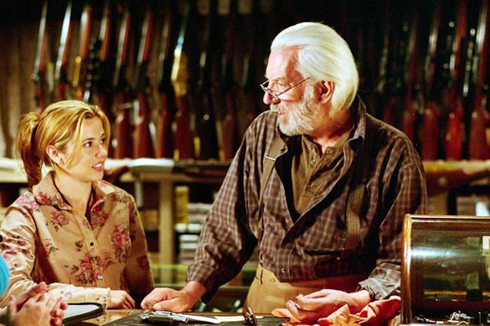 Linda Cardellini as Mary-Anne and Donald Sutherland as Carl in American Gun (2006)