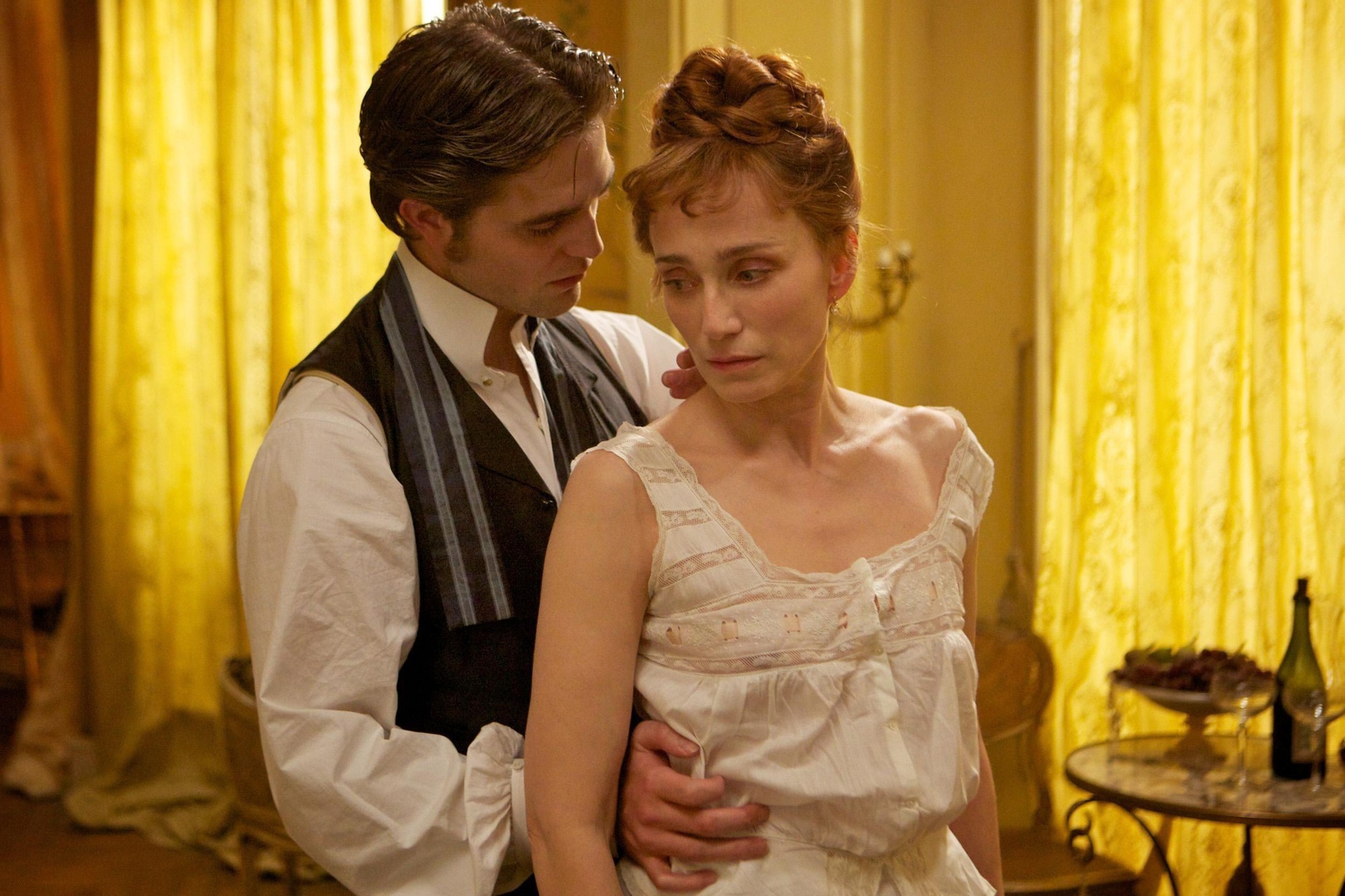 Robert Pattinson stars as Georges Duroy and Kristin Scott Thomas stars as Virginie Walters in Magnolia Pictures' Bel Ami (2012)
