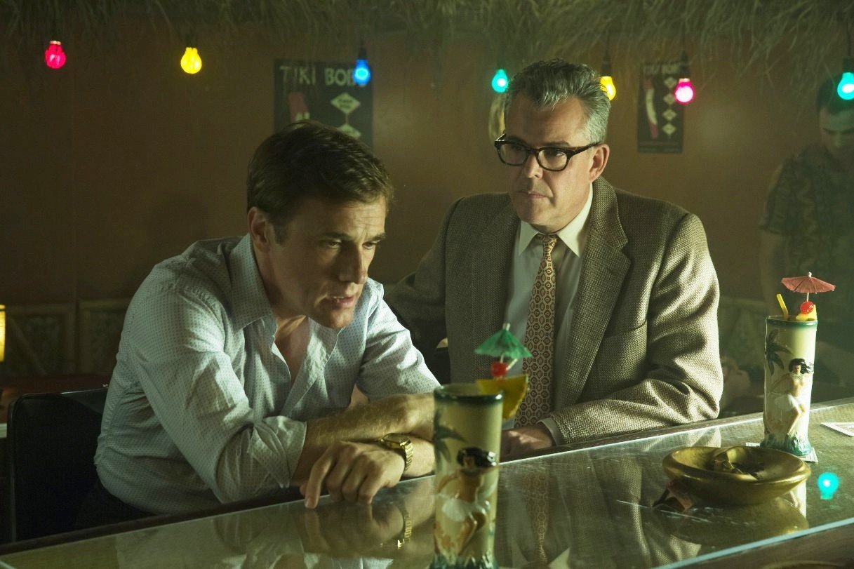 Christoph Waltz stars as Walter Keane and Danny Huston stars as Dick Nolan in The Weinstein Company's Big Eyes (2014). Photo credit by Leah Gallo.