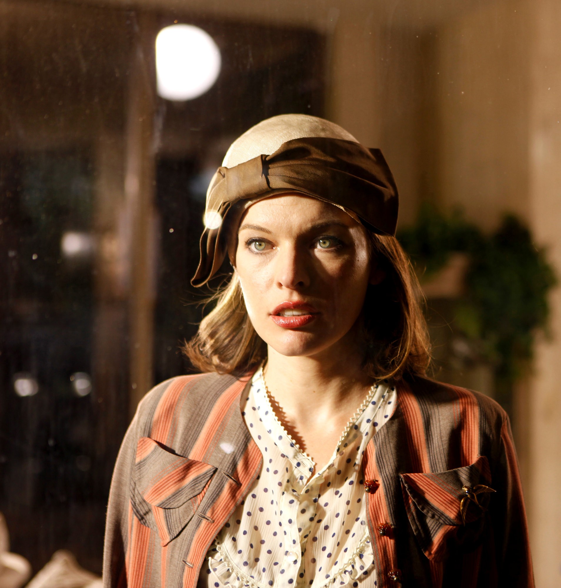 Milla Jovovich stars as Olive in Monterey Media's Bringing Up Bobby (2012)