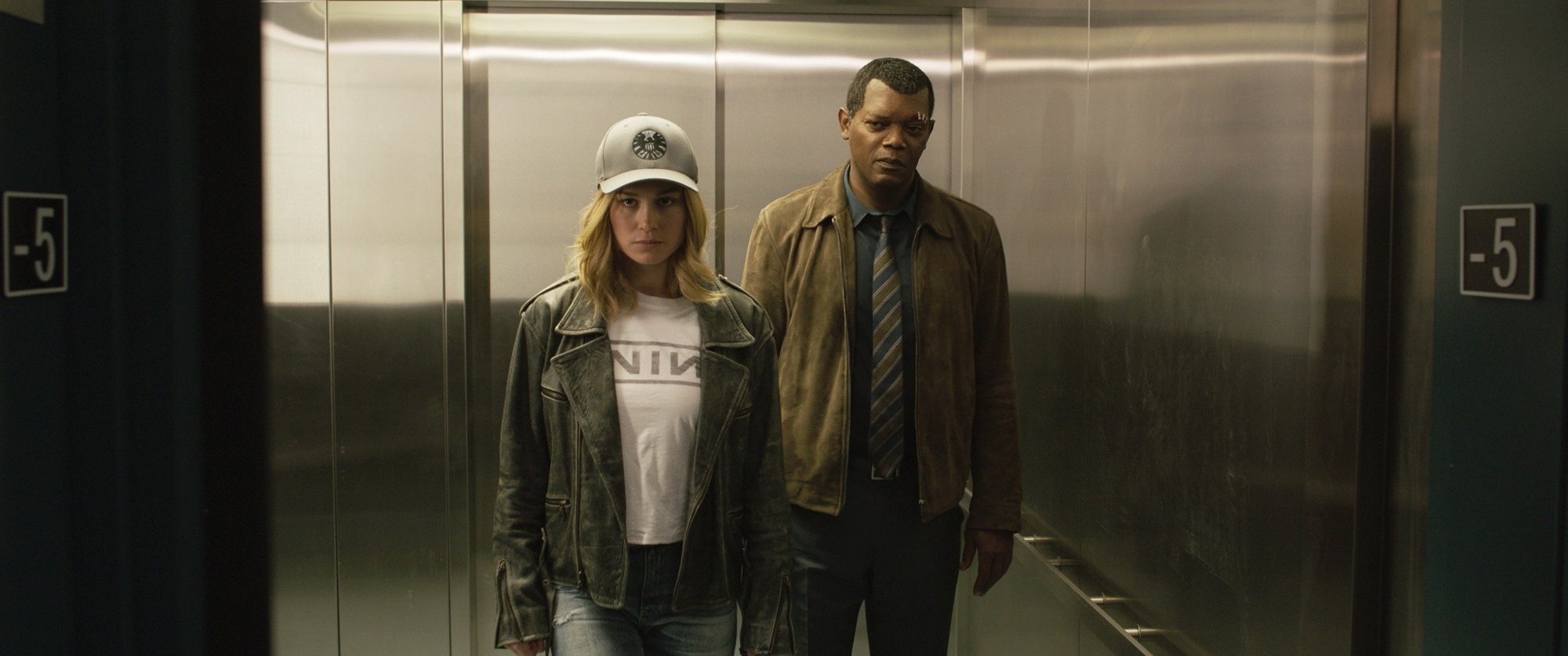 Brie Larson stars as Carol Danvers/Captain Marvel and Samuel L. Jackson stars as Nick Fury in Marvel Studios' Captain Marvel (2019)