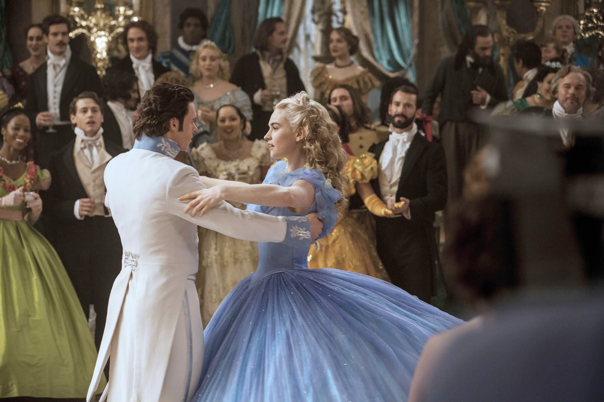Richard Madden stars as Prince Charming and Lily James stars as Cinderella in Walt Disney Pictures' Cinderella (2015). Photo credit by Jonathan Olley.