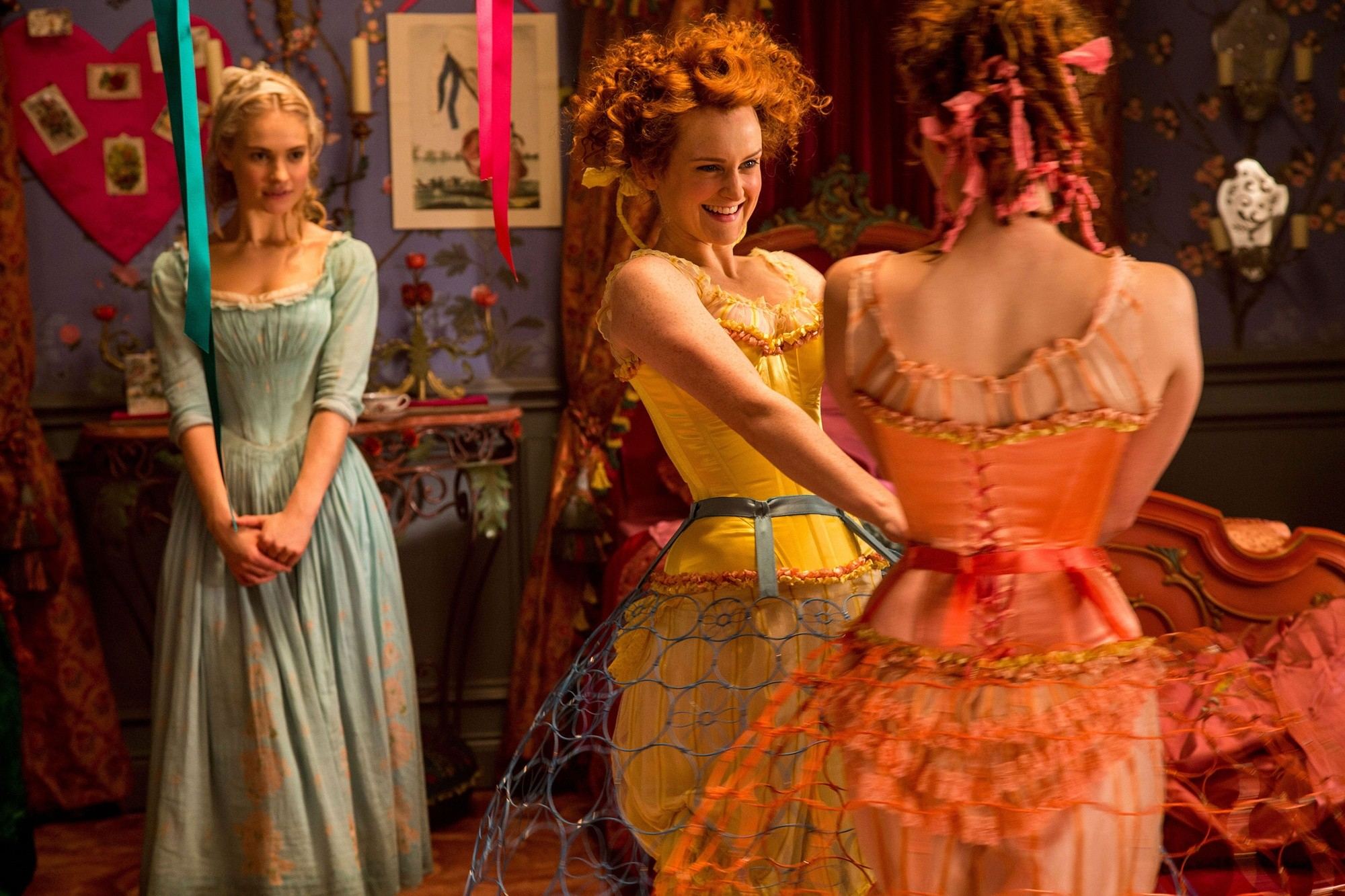 Lily James stars as Cinderella and Sophie McShera stars as stars as Drizella in Walt Disney Pictures' Cinderella (2015)