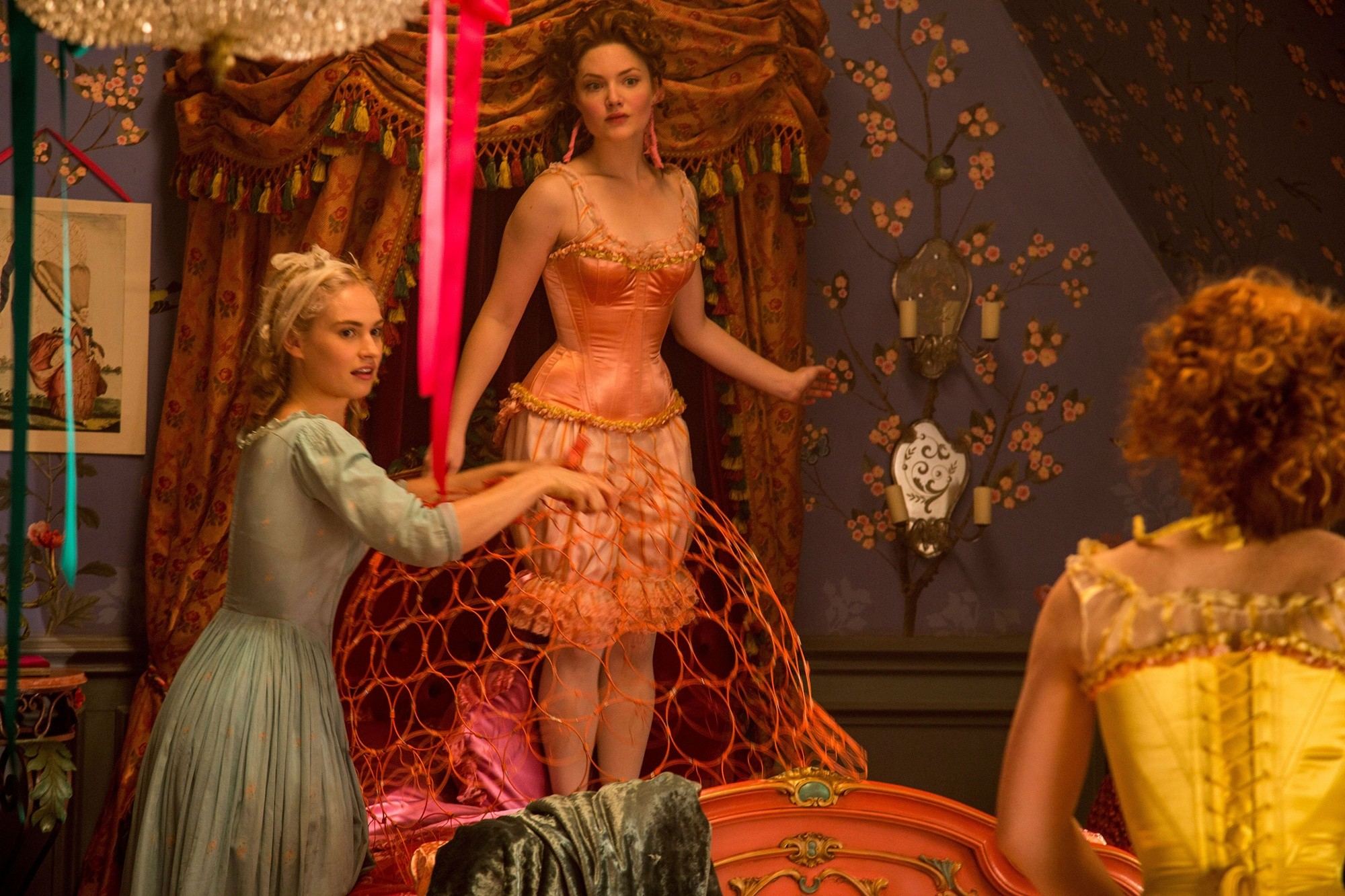 Lily James stars as Cinderella and Holliday Grainger stars as Anastasia in Walt Disney Pictures' Cinderella (2015)