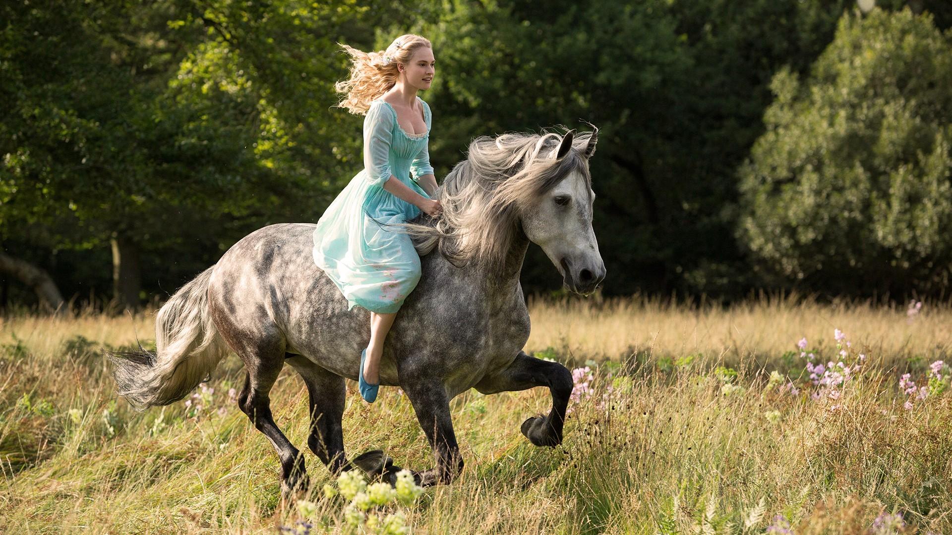Lily James stars as Cinderella in Walt Disney Pictures' Cinderella (2015). Photo credit by Giles Keyte.