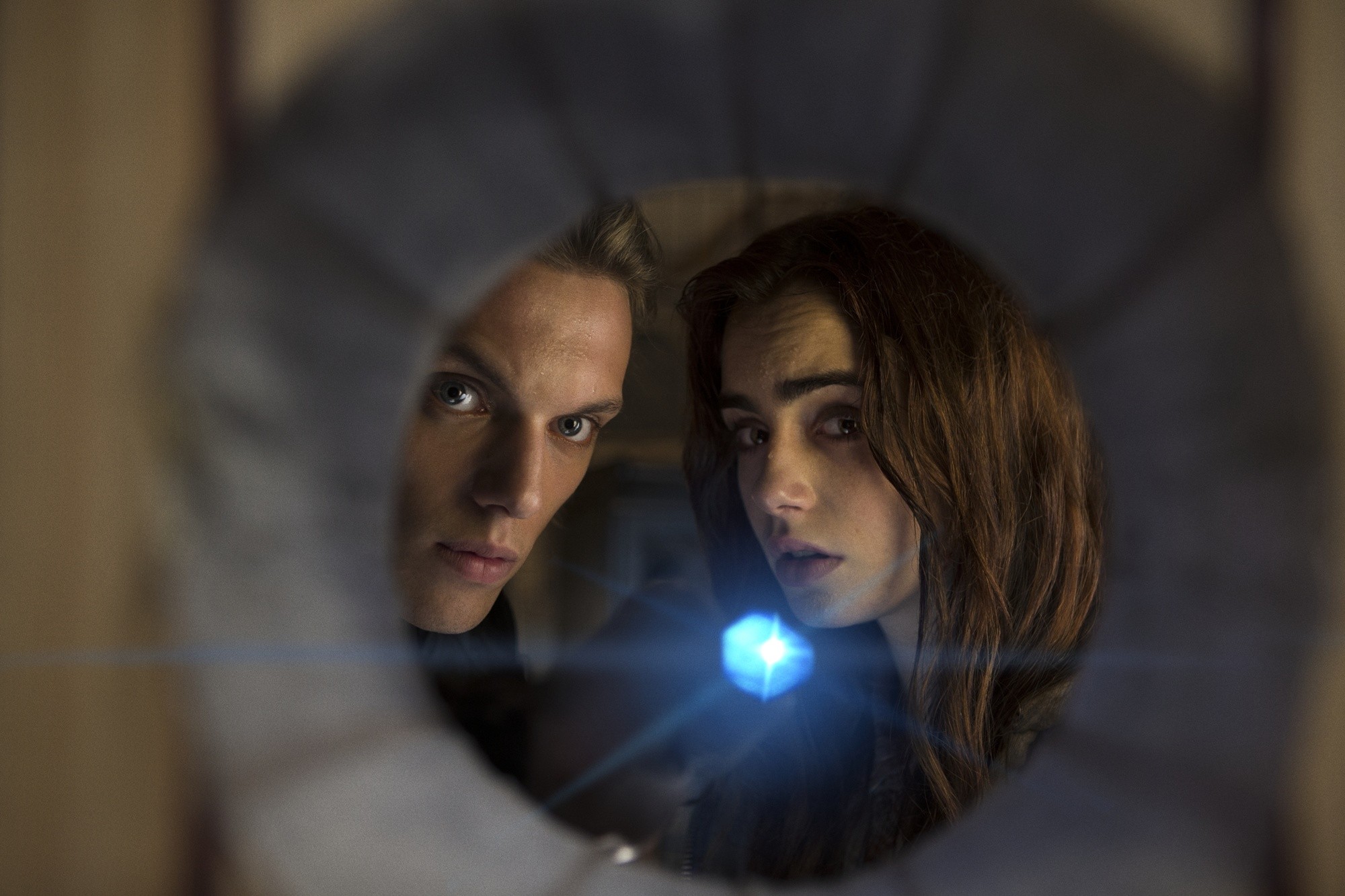 Jamie Campbell Bower stars as Jace Wayland and Lily Collins stars as Clary Fray in Screen Gems' The Mortal Instruments: City of Bones (2013). Photo credit by Rafy.