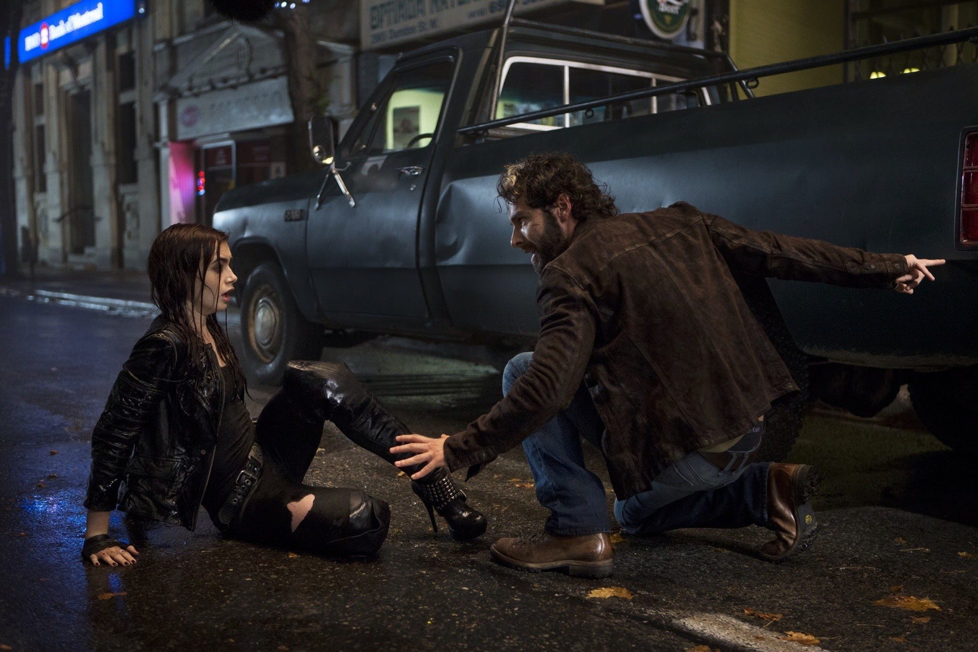 Lily Collins stars as Clary Fray and Aidan Turner stars as Luke in Screen Gems' The Mortal Instruments: City of Bones (2013). Photo credit by Rafy.
