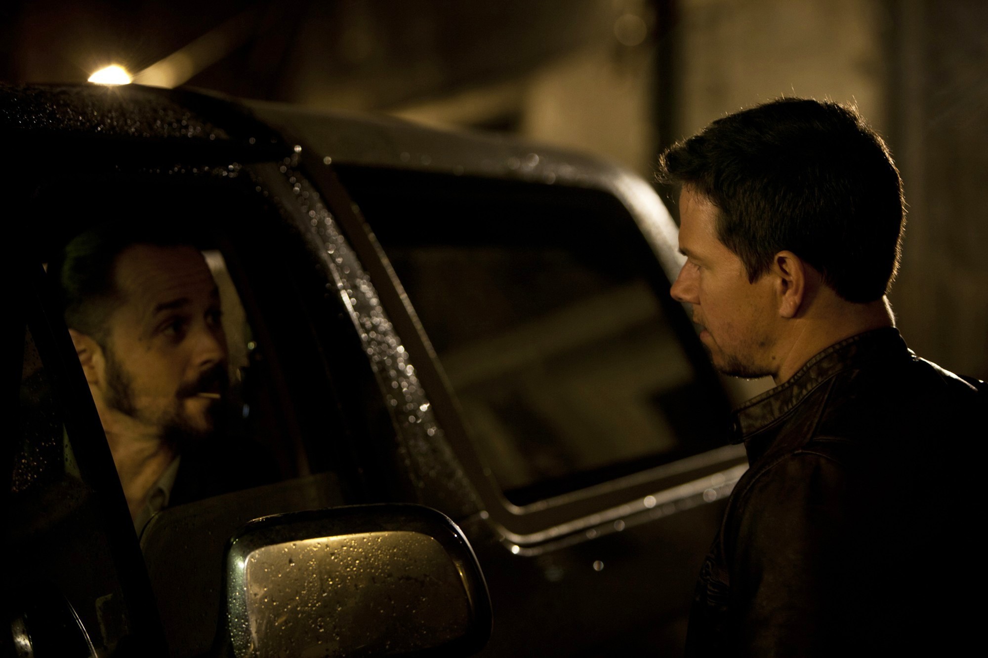 Giovanni Ribisi stars as Tim Briggs and Mark Wahlberg stars as Chris Farraday in Universal Pictures' Contraband (2012)